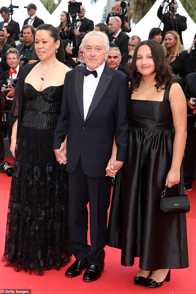 De Niro pictured with girlfriend Tiffany (L) and daughter, Helen, 14 (R)