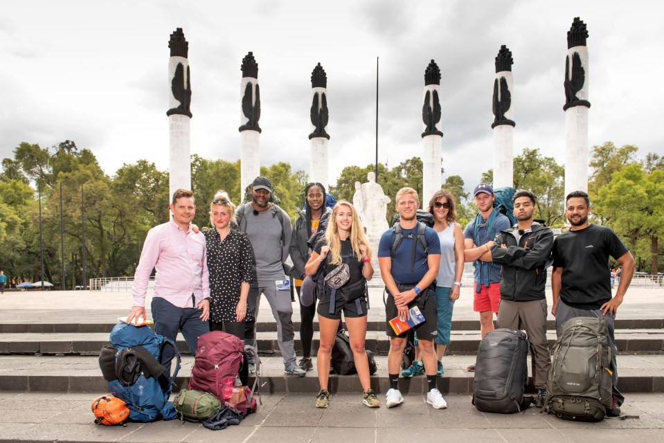Group of people with backpacks in Chapultepec Park, Mexico City.