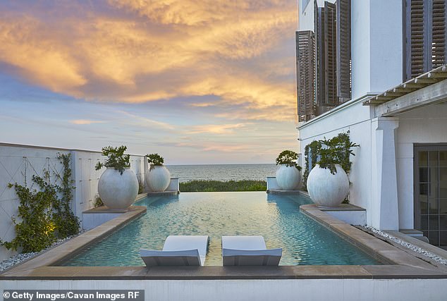 A newly built oceanfront property in the ritzy Alys Beach neighborhood sold for $24 million, a record in the area but still well short of the $120 million record for a beachfront Miami mansion