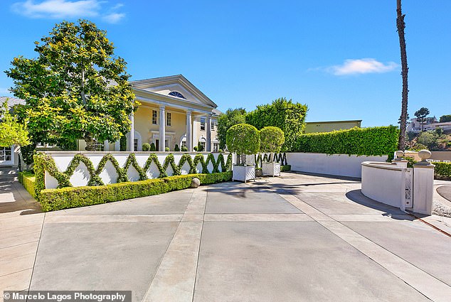 A view of the gated entryway into the property