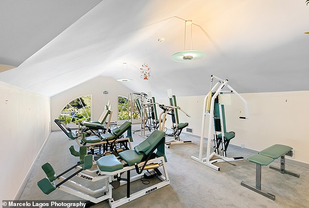 The four-bedroom home contains a home gym