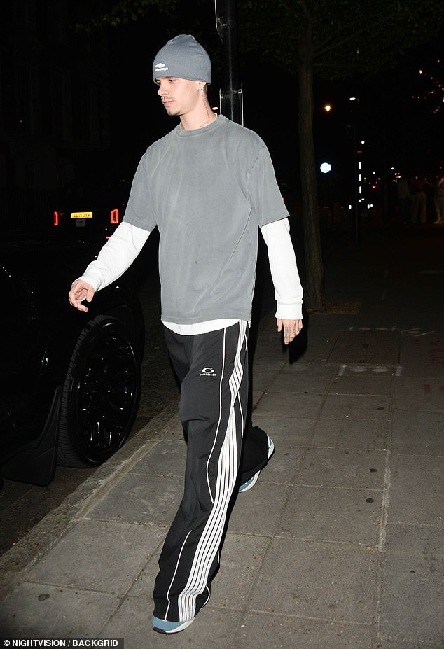 He also added a grey Balenciaga beanie hat to his comfortable designer ensemble