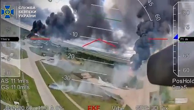 Smoke billows in multiple locations across a Russian airfield following the extensive drone strikes