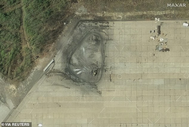A satellite image shows a cleanup of debris in the aftermath of a drone strike at the Olenya air base, Russia, after Ukrainian drone strikes