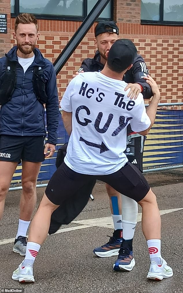 Offering some much-needed motivation on the starting line, Joshua was dressed in a 'he's the guy' T-shirt as he prepared to join Sam for the first part of his run