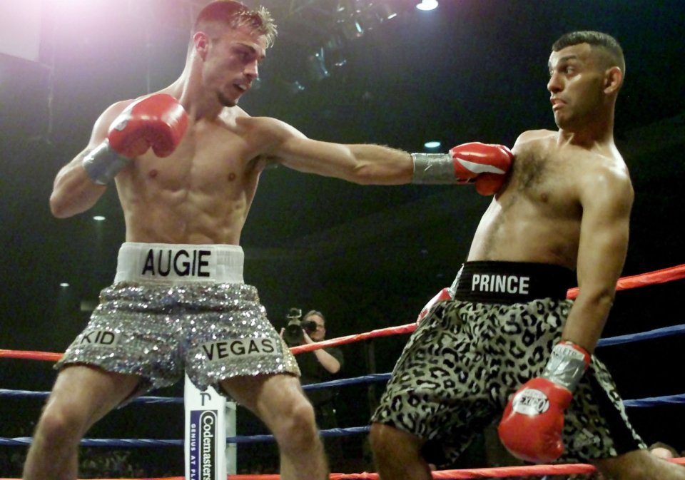 Augie Sanchez avoids a punch from Prince Naseem Hamed in a boxing match.