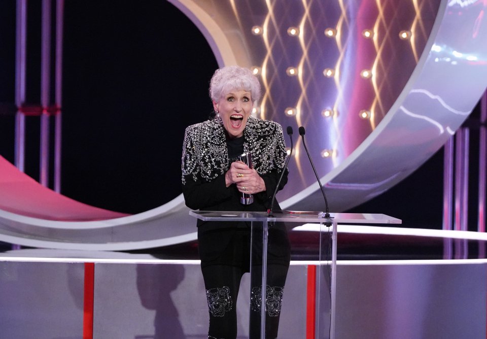 Anita Dobson accepting an award at the British Soap Awards.