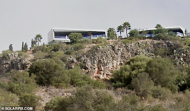 His body was found on the steep hillside below luxury villas in Cerro da Aguia near the party resort of Albufeira