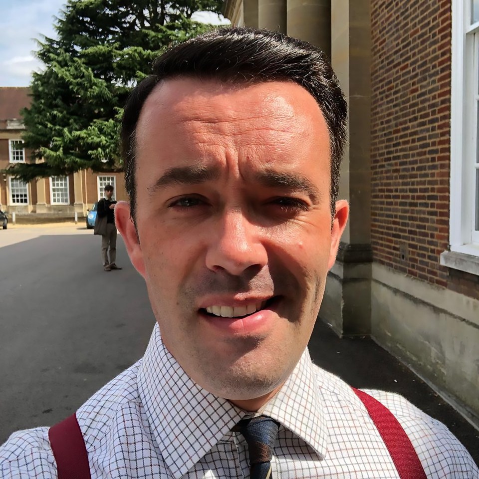 Selfie of James Yeates wearing a checked shirt and suspenders.