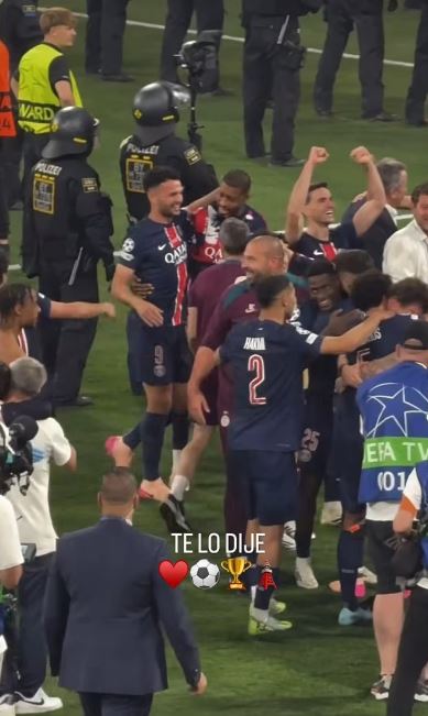 Soccer players celebrating a victory.
