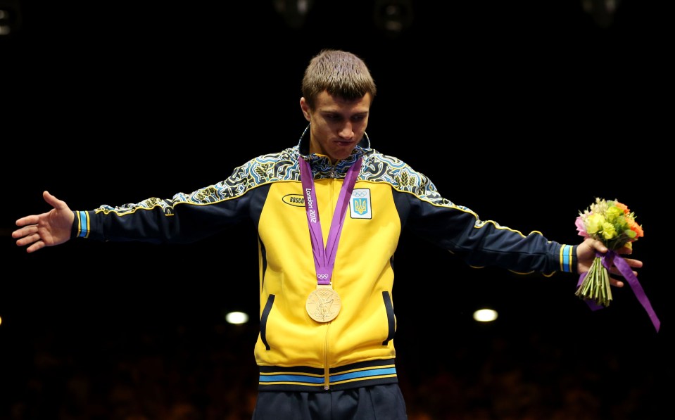 Vasyl Lomachenko of Ukraine at an Olympic medal ceremony.