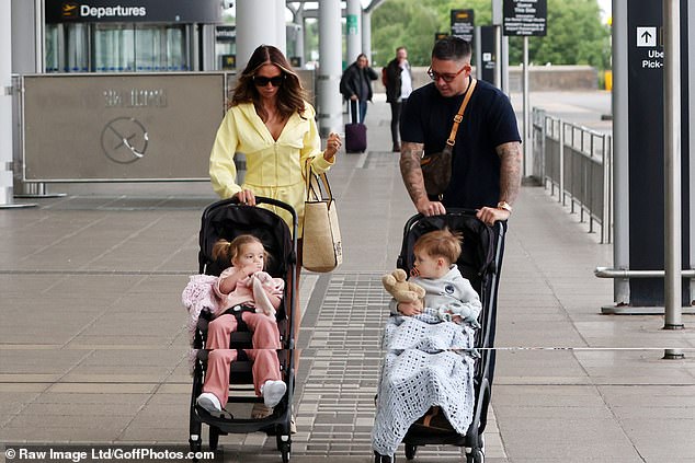 Amy and Billy pushed their twins Amelia and Billy in their prams
