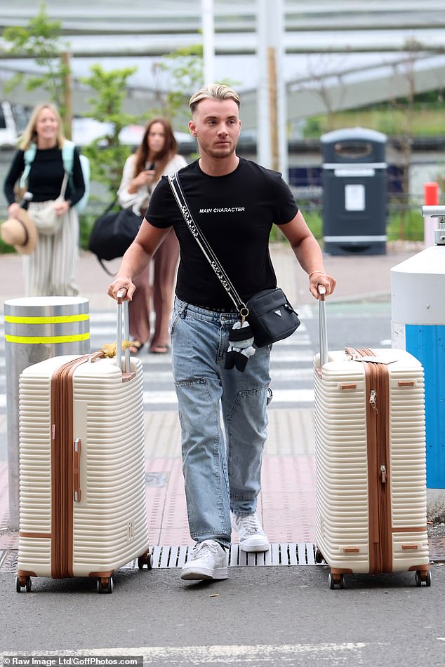 Joe's ex Harry Derbidge arrived wearing a 'main character' T-shirt