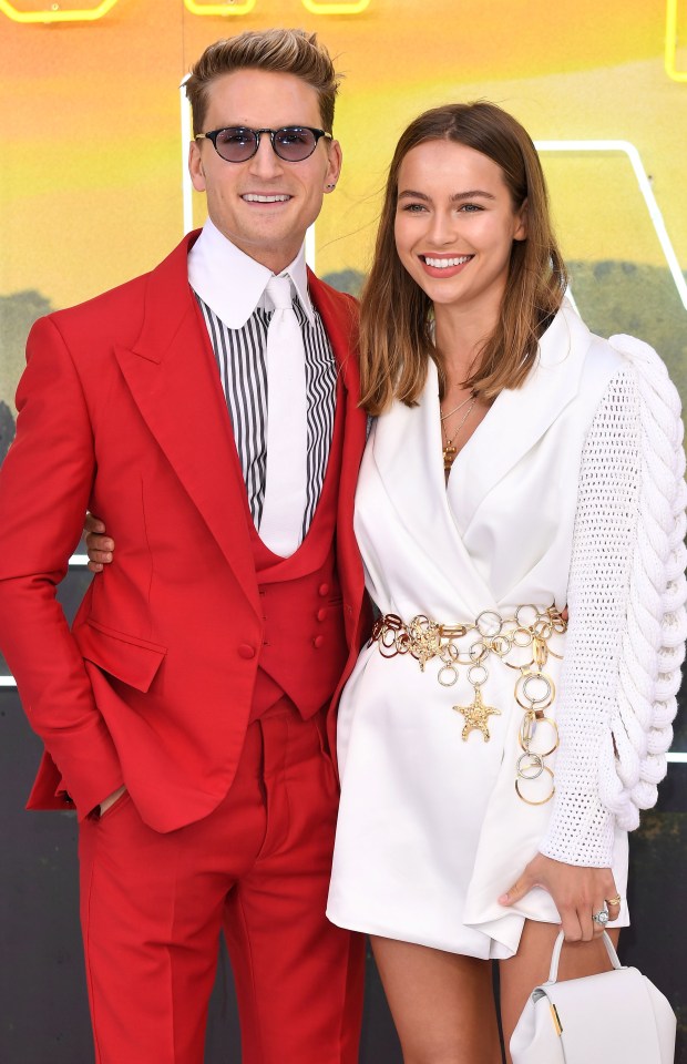 Oliver Proudlock and Emma Louise Connolly at a film premiere.