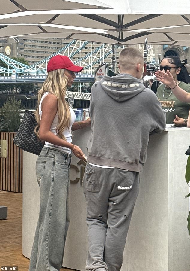 The son of Jeff Brazier and the late Jade Goody , 20, was beaming from ear to ear over drinks with Tasha, 22, in London