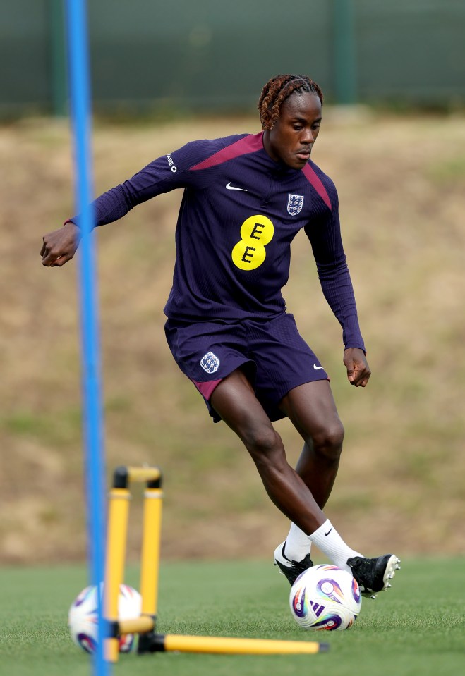 Trevoh Chalobah of England dribbling a soccer ball during a training session.