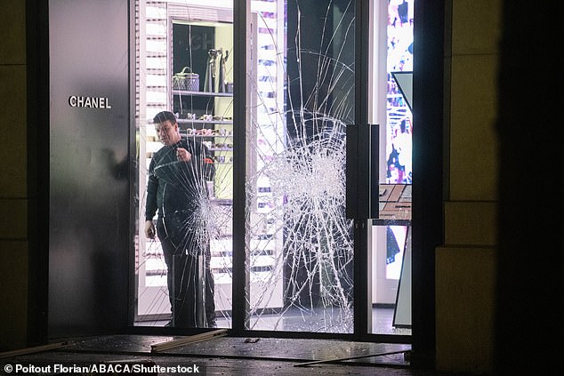 While many shops on the Champs-Elysees were protected ahead of the Champions League final, some did not escape damage