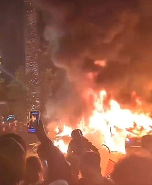 Police and firefighters were heard urgently moving people on for their safety