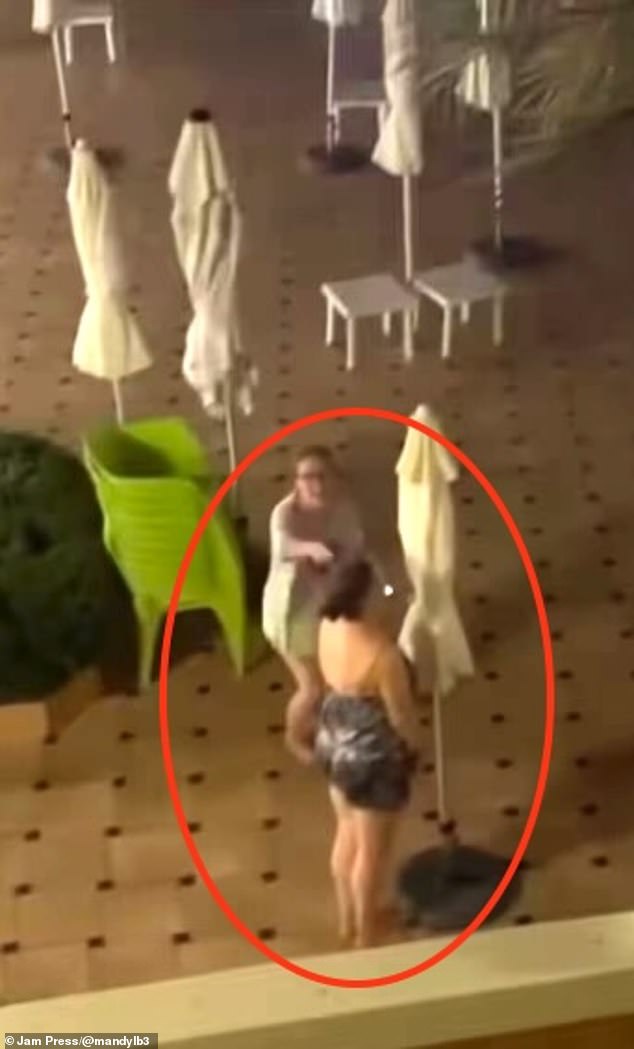 Ms Simpson had been looking forward to spending a day by the poolside and was given permission to reserve sun loungers due to her disability. But when the family arrived in the morning, the towels were gone. Pictured: Tourists moving the towels