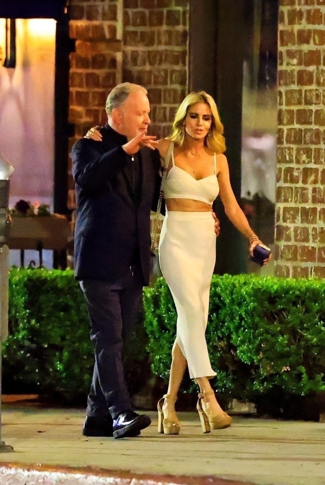 Paul Kemsley and Shana Wall walking together.