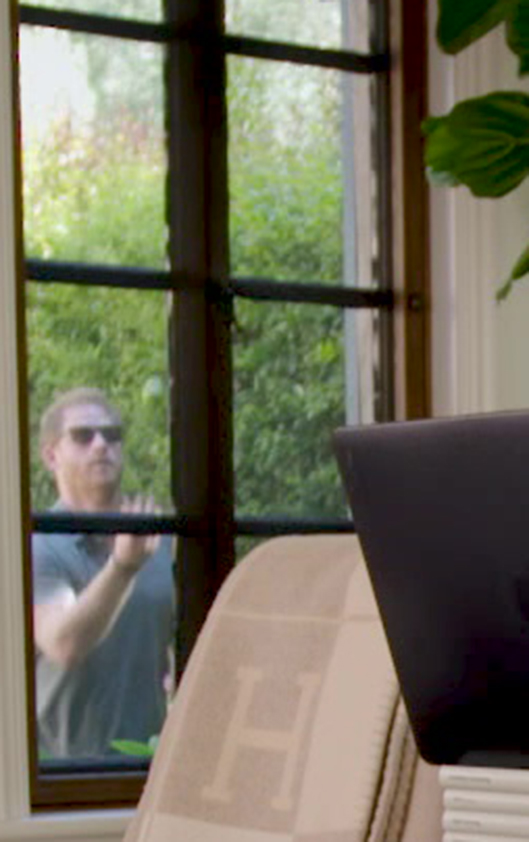 Prince Harry juggling in a video cameo.