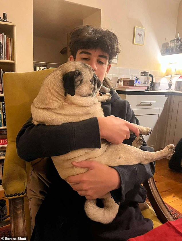 Ozzie, pictured with Serena's younger brother Harry, 14, has been with the family since he was just a few weeks old