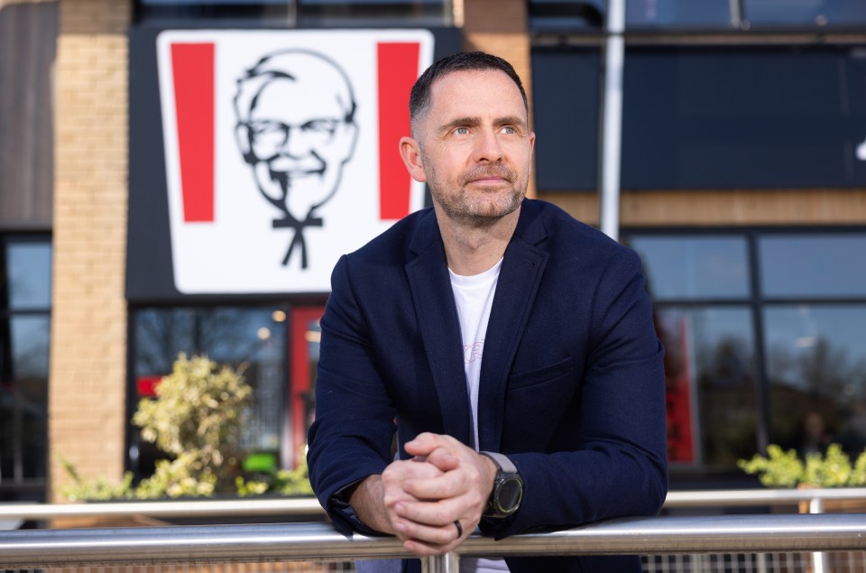 Rob Swain, General Manager of KFC UK & Ireland, standing outside a KFC restaurant.