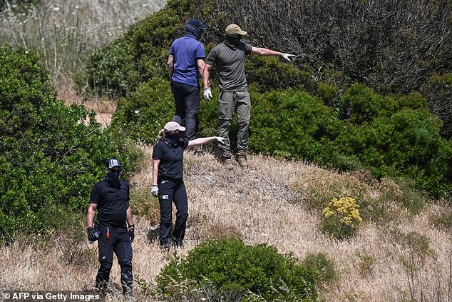 Police investigators search an area during an operation in the investigation into the disappearance of Madeleine (or Maddie) McCann at Atalaia, Lagos in Algarve on June 5, 2025