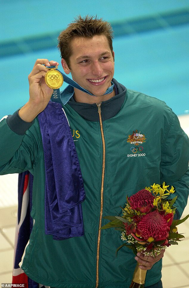 Thorpe is pictured celebrating one of his three gold medals at the 2000 Olympics in Sydney