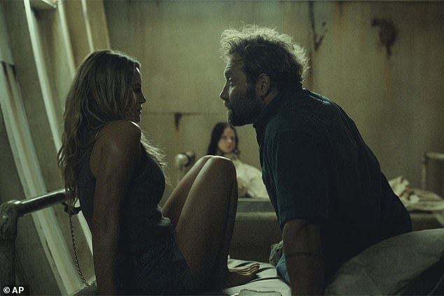It's a horror-thriller set on Australia's Gold Coast that preys on our fear of serial killers, and our fear of the deep (pictured: Hassie Harrison and Courtney)