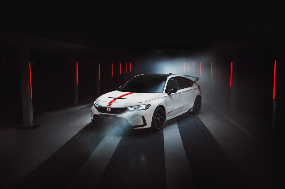 White Honda Civic Type R Ultimate Edition in a garage.