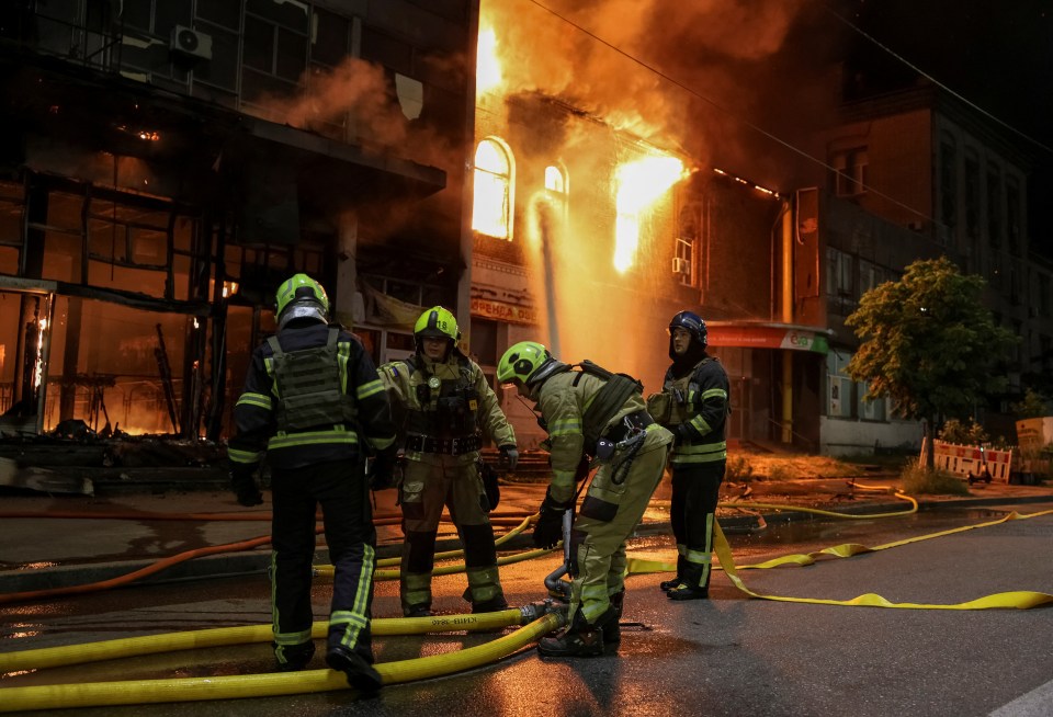 Firefighters battling a fire at a building in Kyiv, Ukraine.