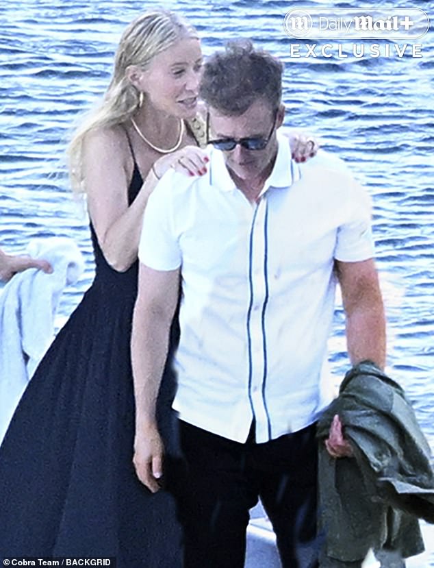 She seemed in great spirits, smiling widely and laughing alongside her husband and friends. She is seen with Norton