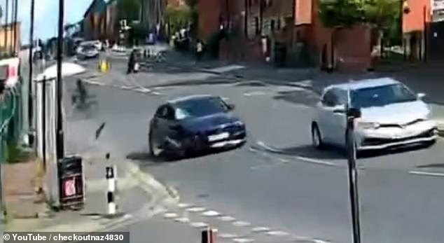 The Audi driving in the opposite direction, appears to swerve into the lane the riders are on and hits one of them