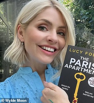 The snap was eerily similar to an image posted by Holly, while she promoted her Wylde Library, a collection of books on the official brand's website