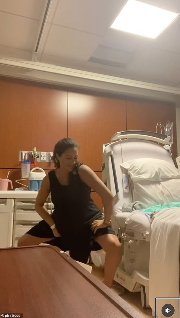 In Meghan's video, taken four years ago just before the birth of Lillibet, her hair is in a ponytail and she is wearing a sleeveless black summer dress which she pulls up as she shimmies towards the camera