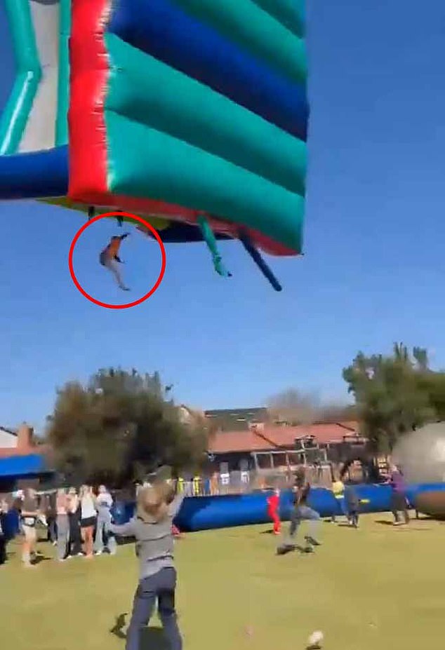 The horror happened during a fund-raising day at a school in South Africa when an unexpected gust caused the apparently untethered inflatable to take flight