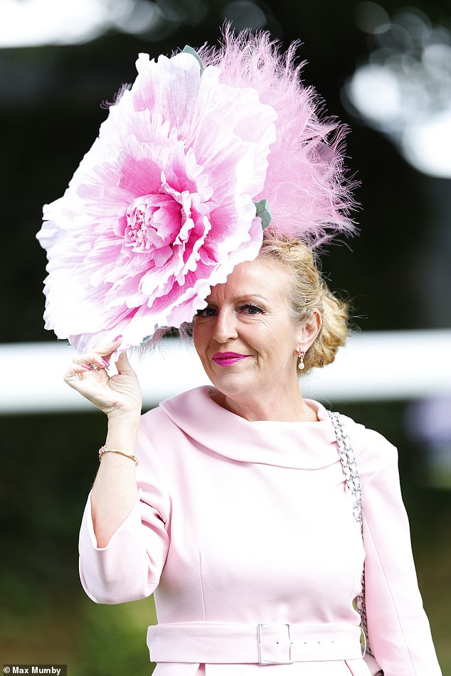 The hats were as vibrant as ever, as one racegoer opted for bright shades of pink