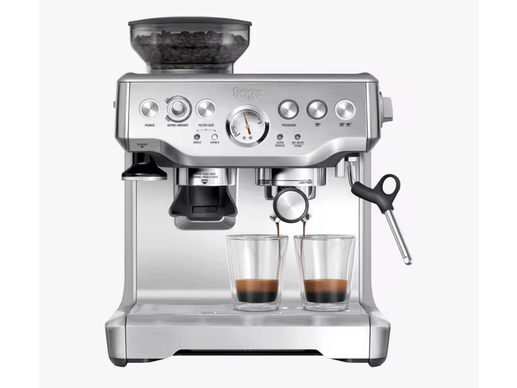 Sage espresso machine making espresso in two glasses.