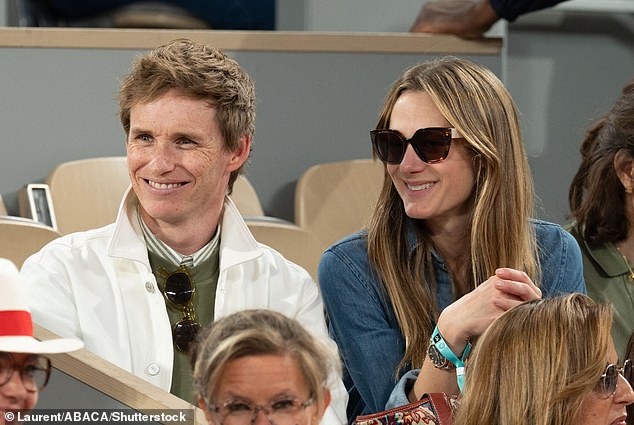 Meanwhile publicist Hannah oozed Parisian chic in a denim dress and shades while posing up a storm before taking her seat in the VIP stands