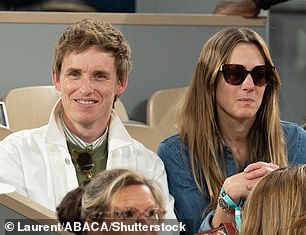 The couple couldn't take their eyes off the match
