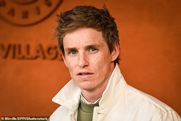 The Oscar winner cut a stylish figure in a green sweater and jeans which he layered with an alabaster Lacoste sports jacket.
