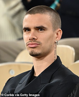 Romeo, 22, who The Mail revealed on Wednesday had split from girlfriend Kim Turnbull after seven months, couldn't contain his excitement as he watched the match