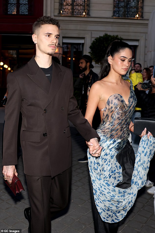 Friends told The Mail that things remain ¿amicable¿ between Romeo and Kim, and that their parting is ¿nothing to do¿ with Kim being blamed by Nicola Peltz for being the catalyst for the feud that has ripped the Beckham family apart (pictured in Paris in March)