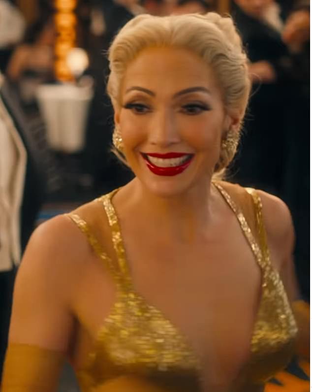 In one scene Jennifer has a plunging gold dress on
