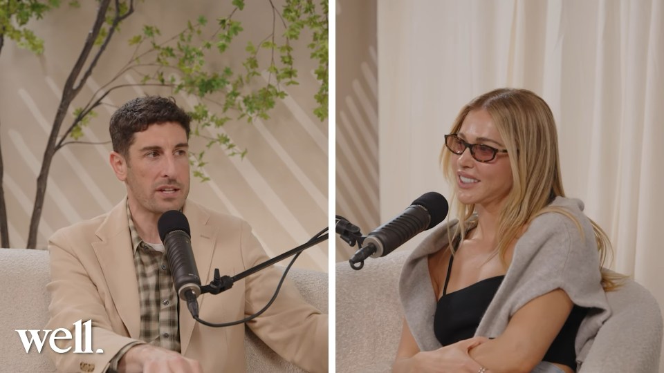 Two people being interviewed with microphones.