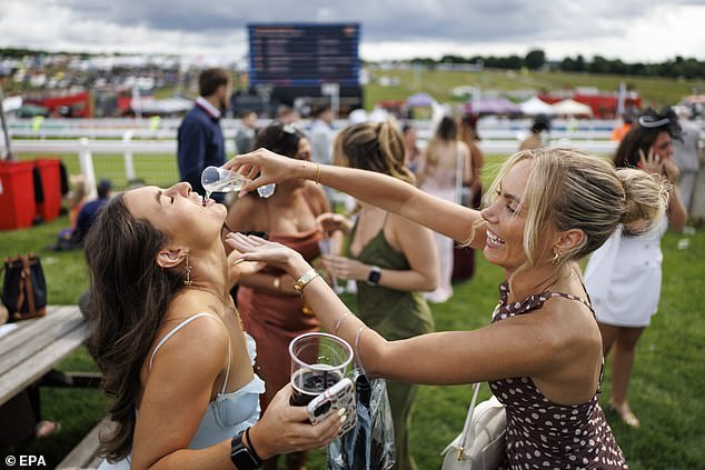 Racegoers were in high spirits as Ladies Day got underway at the Epsom Derby on Friday