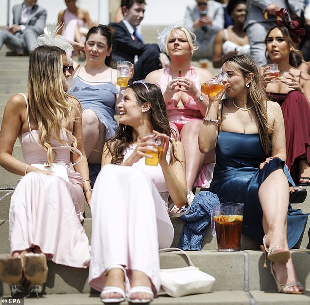 Beer O'clock! As the races commenced, it was time for revellers to have pints and Pimms