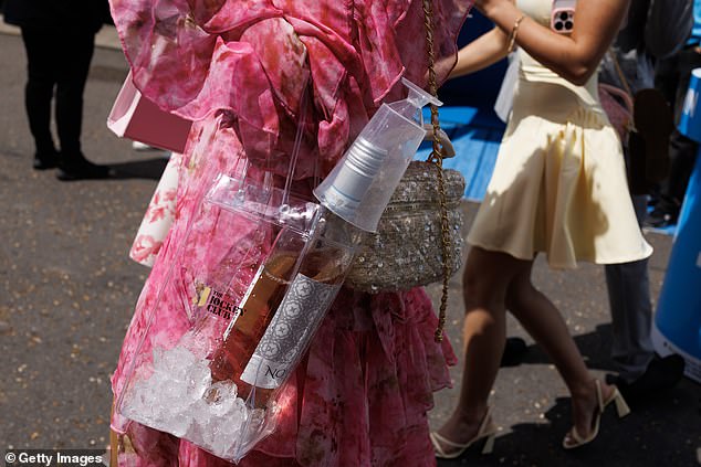 Racegoers ready for an afternoon of fun were ready to go with bottles of wine and ice