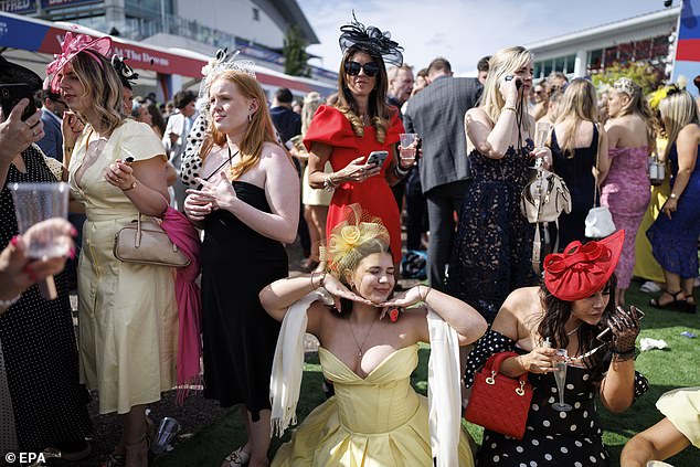 Feeling festive: In between races, visitors enjoyed sunshine and spirits
